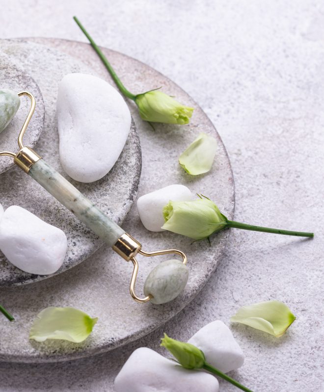 Green jade facial roller for skincare Green jade facial roller for massaging and skincare
